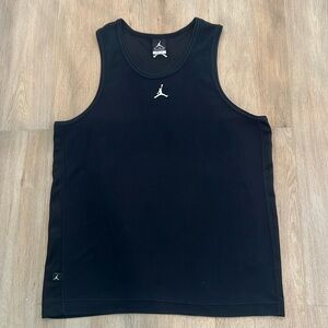 Nike ribbed tank with dry fit mesh side panels.